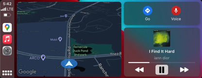 BMW infotainment display with Apple CarPlay split screen showing Google Maps navigation and music playback