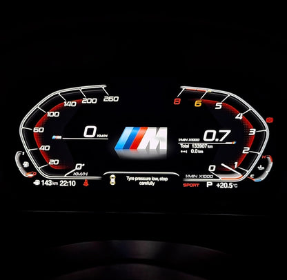 BMW digital instrument cluster with Apple CarPlay M-style layout