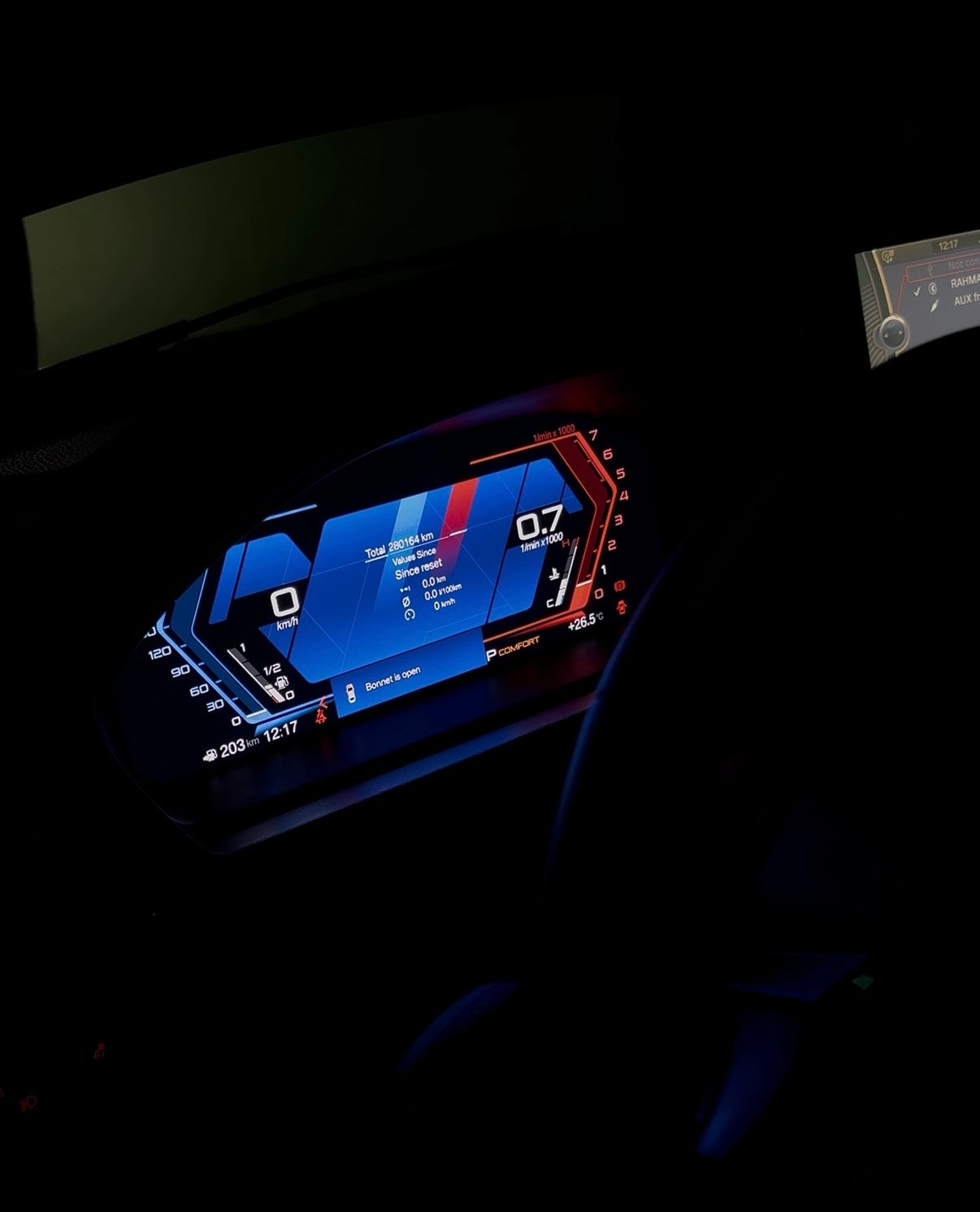 BMW digital instrument cluster with performance data display, M-style graphics and customizable dashboard layout