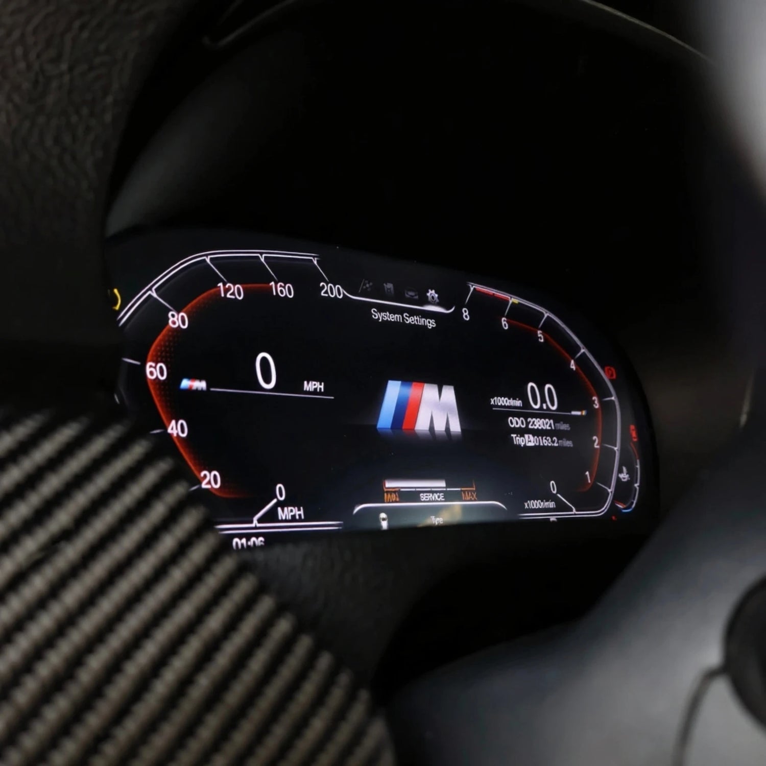 Bimmerbunny BMW cockpit cluster with digital display showing M logo