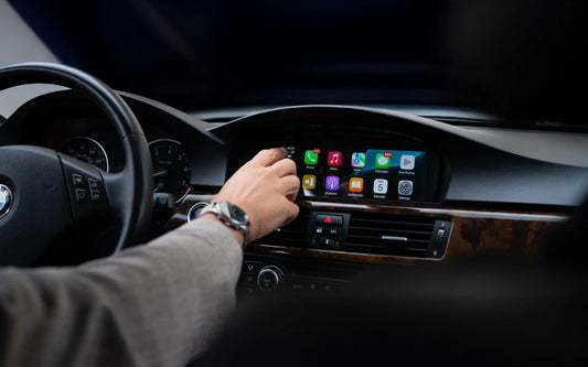 BMW 3 Series E90 E91 E92 E93 infotainment touchscreen with Apple CarPlay and Android Auto retrofit installed in dashboard