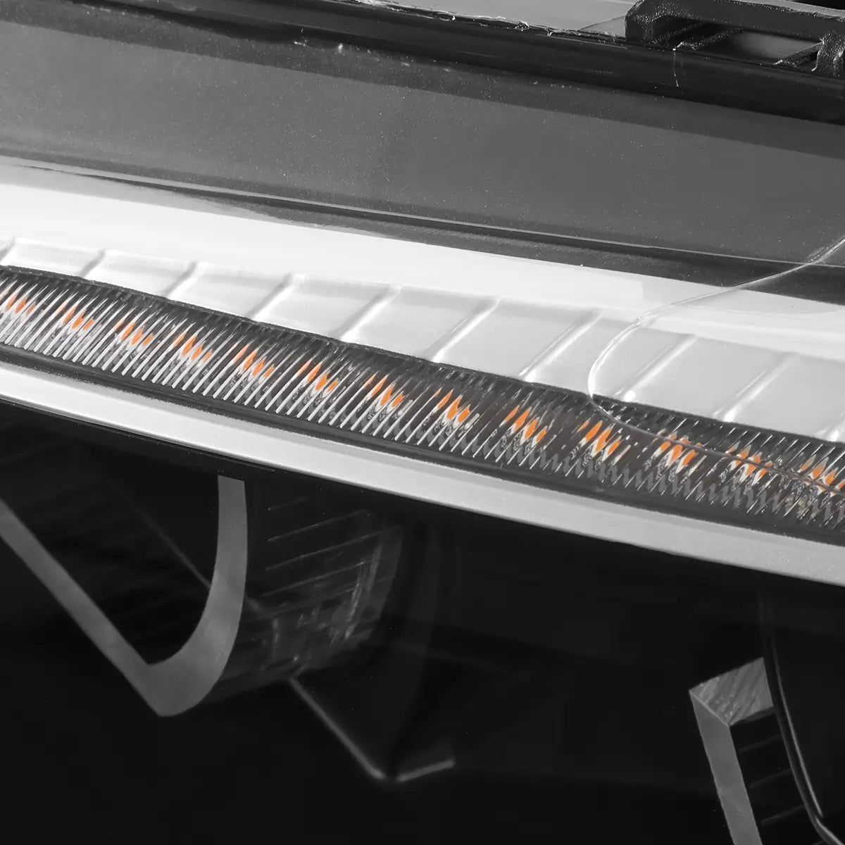 Close-up of BMW E92 E93 LED headlight showing the upper sequential turn signal light bar above the 3D crystal DRL