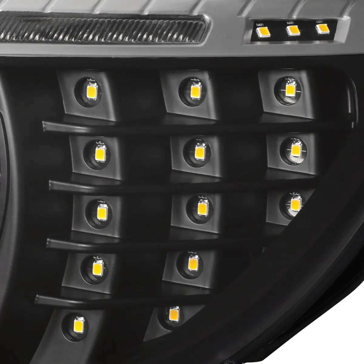 Close-up of BMW E92 E93 LED headlight side marker showing individual LED elements and upper indicator light section