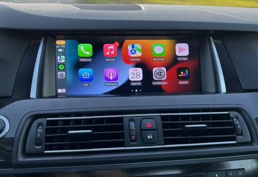Apple CarPlay screen replacement installed in BMW 5 Series F10 / F11 and BMW 7 Series F01 / F02 with OEM-style dashboard integration