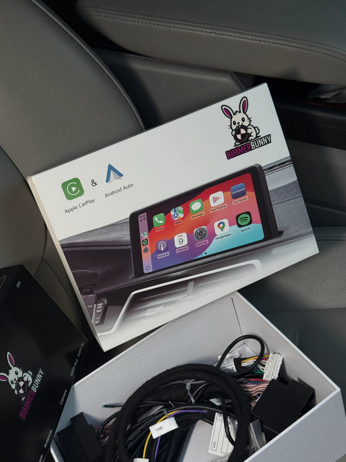 BimmerBunny BMW wireless CarPlay and Android Auto MMI retrofit kit with cables and product packaging