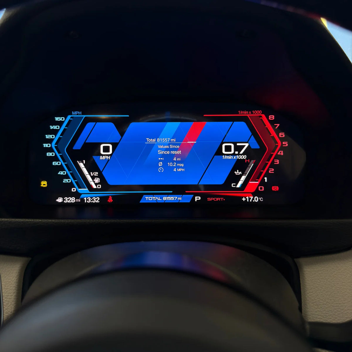 BMW dashboard with digital instrument cluster upgrade displaying various metrics.